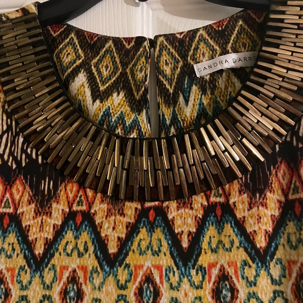 Ladies dress. Never worn. Multi color. 95% polyester 5% spandex